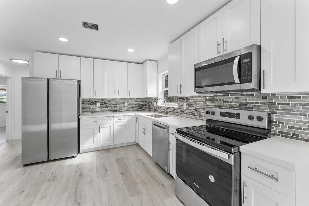 Photo of 364 NW 3 Street, Deerfield Beach, FL 33441 (MLS # R11045445)