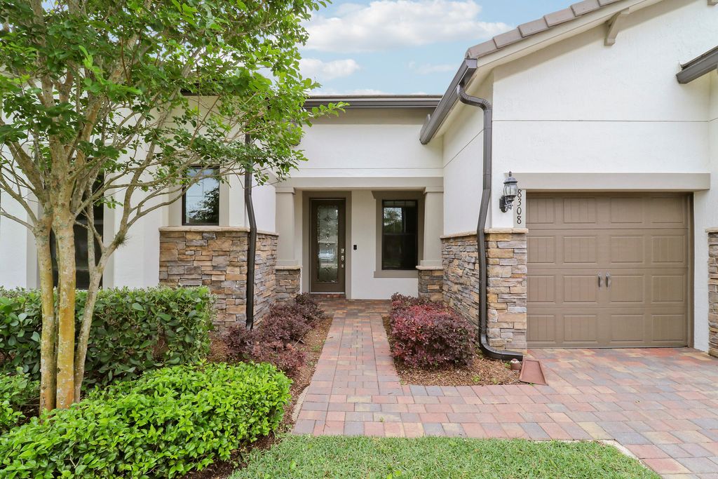 Photo of 8308 Pedigree Circle, Greenacres, FL 33467 (MLS # B26020424)