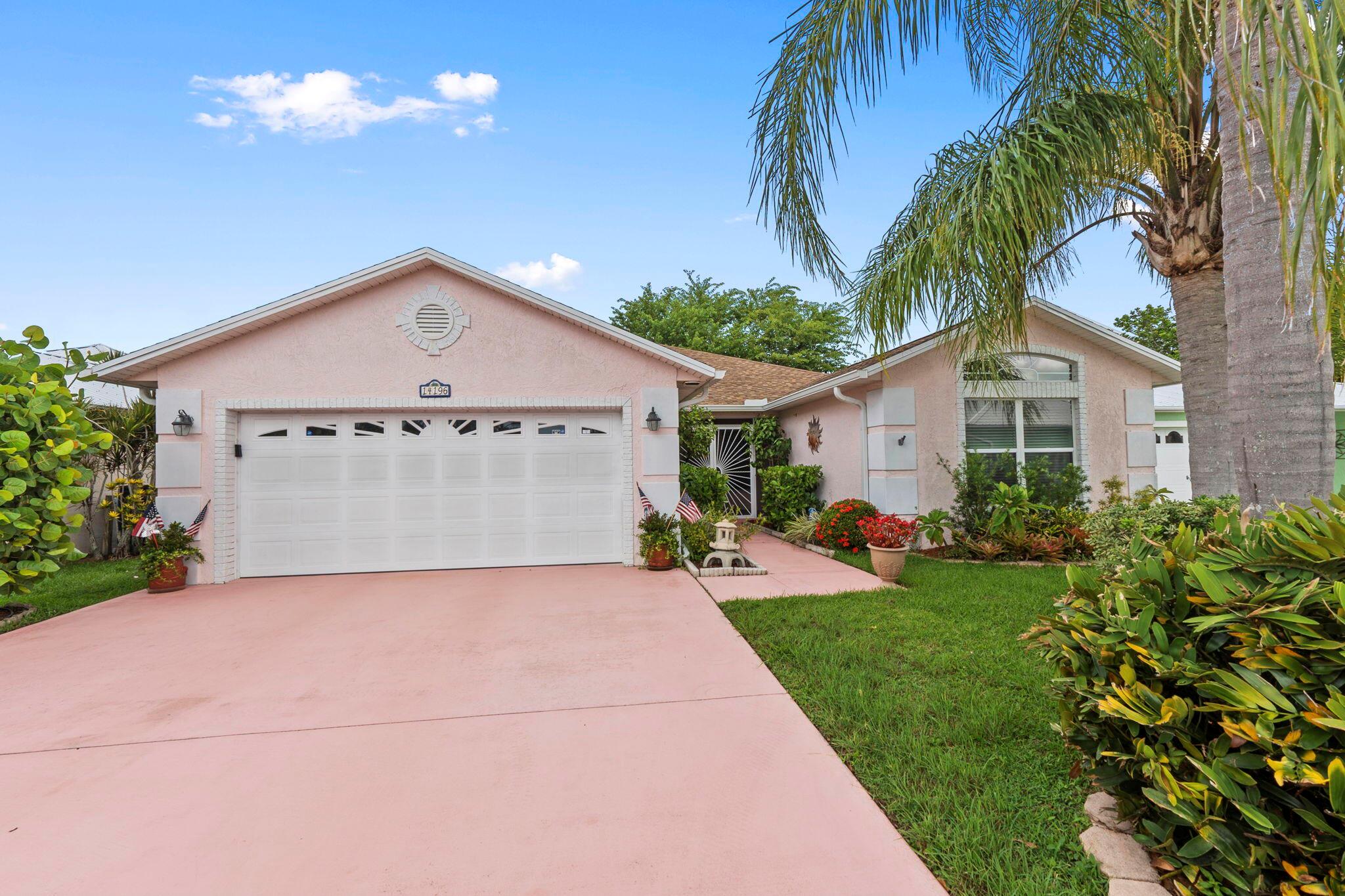 Luxuriously upgraded 3-bed, 2-bath lakefront home with over 1,800 sq ft in the premier 55+ community of Spanish Lakes. Enjoy $80K+ in high-end renovations: 2023 roof & gutters, spa-inspired master bath, designer kitchen, recessed living room bar, custom fireplace, impact glass entry, and full storm protection. Wake up to tranquil lake views in a truly one-of-a-kind home. Spanish Lakes offers resort-style living: free golf, heated pools, tennis, clubhouse, fitness center, and endless social activities. Golf cart friendly, beautifully maintained, and move-in ready.