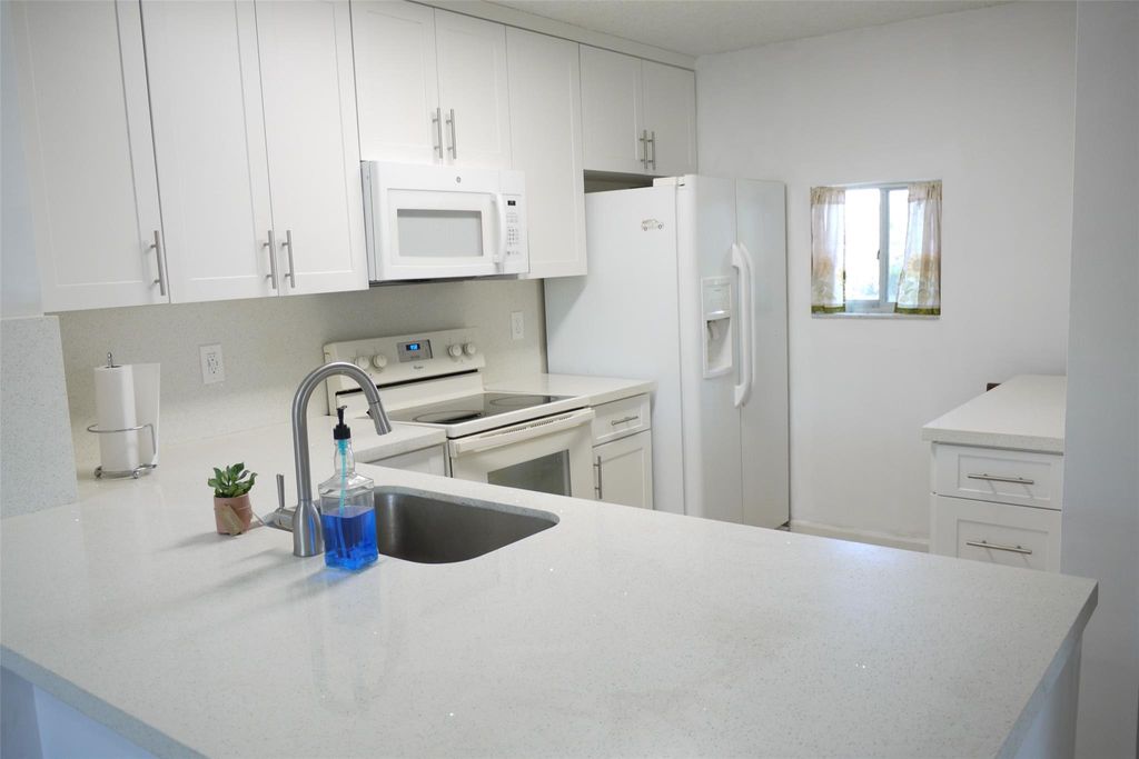 Photo of 7720 NW 50th Street #201, Lauderhill, FL 33351 (MLS # F10498555)