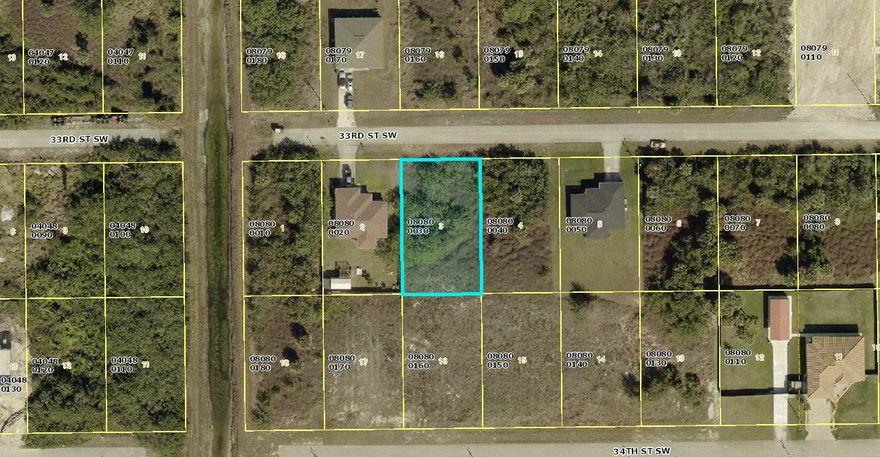 Nice lot on paved road, available for your new Florida home, in Lehigh Acres, Lee County Florida. Buy and build or hold for investment.