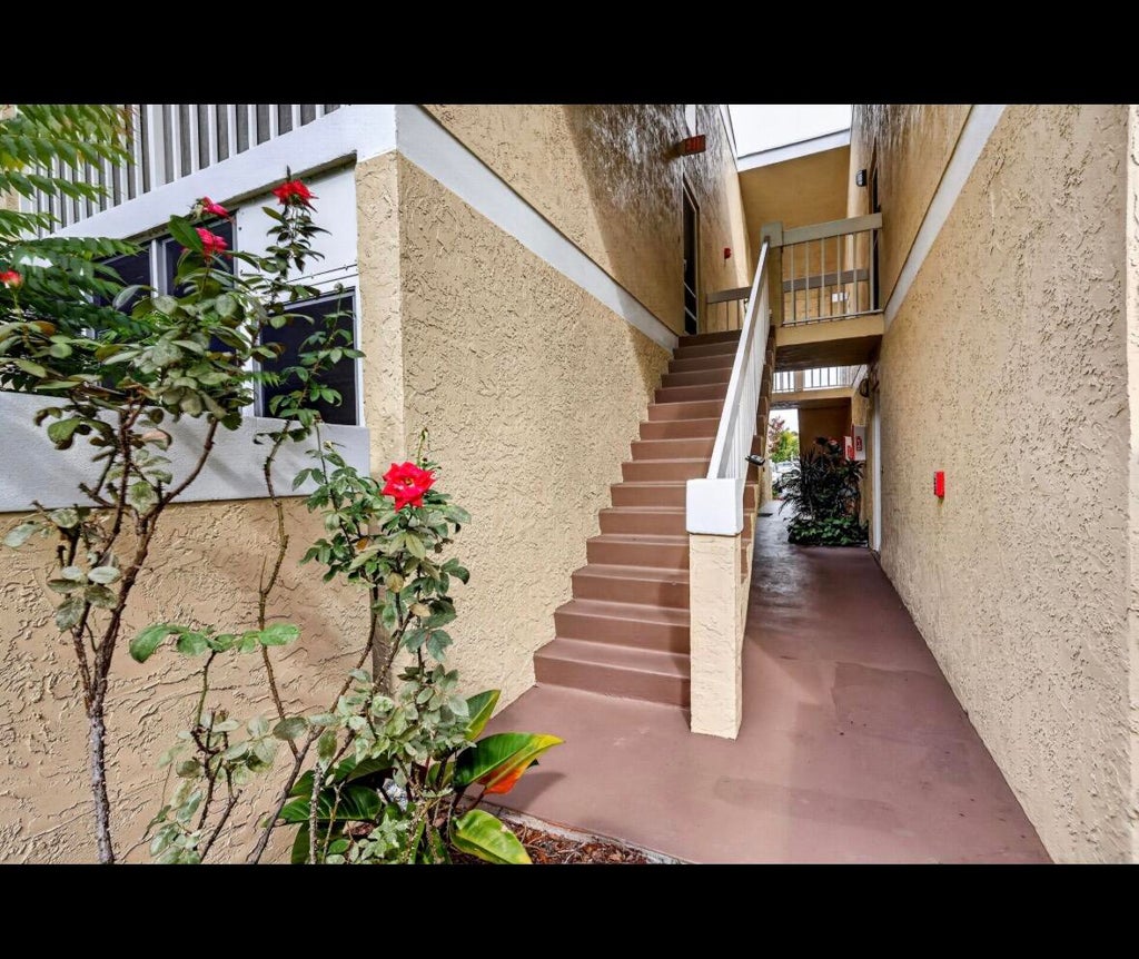 Photo of 1548 SE ROYAL GREEN Circle #206, Port Saint Lucie, FL 34952 (MLS # B26074932)