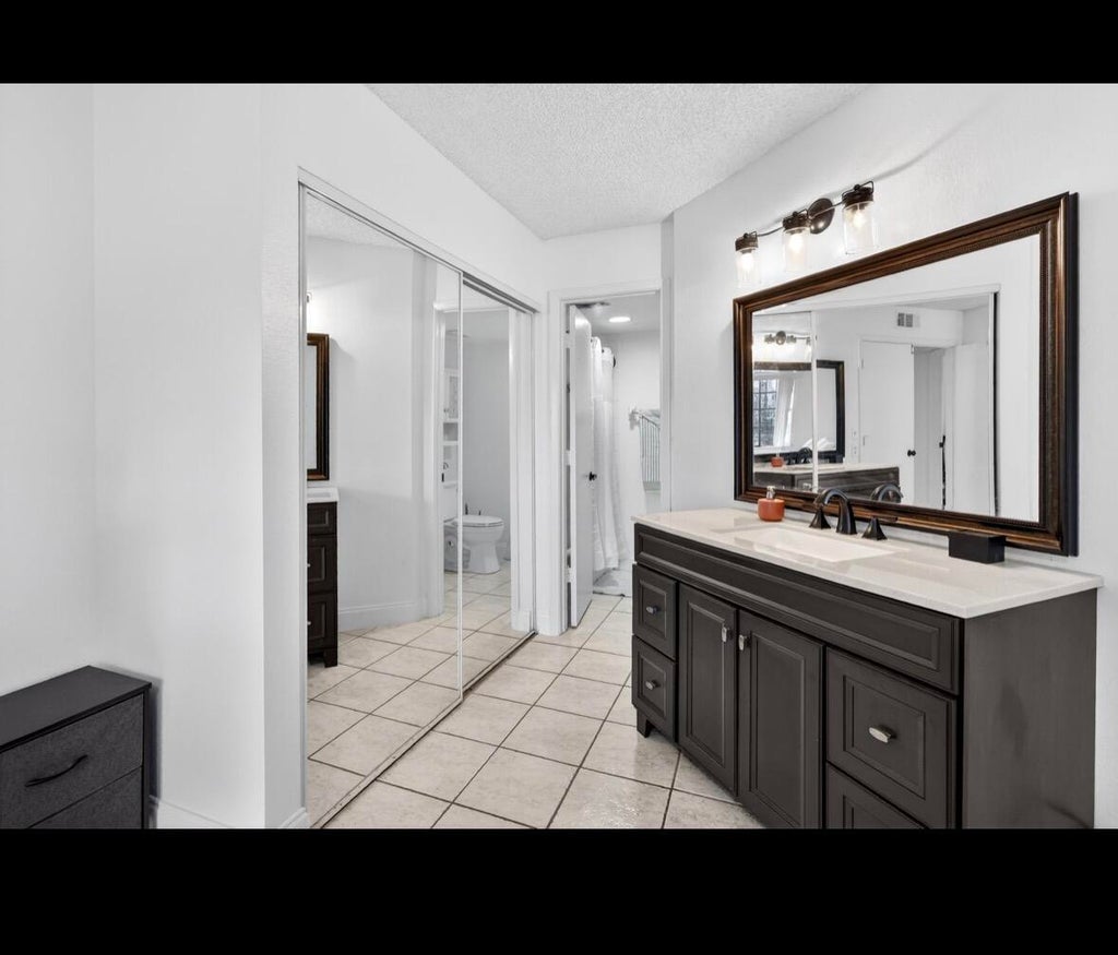 Photo of 1548 SE ROYAL GREEN Circle #206, Port Saint Lucie, FL 34952 (MLS # B26074932)