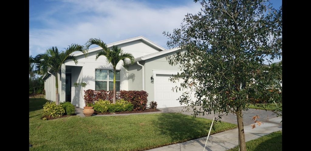 Photo of 11885 SW Lyra Drive, Port Saint Lucie, FL 34987 (MLS # R10769043)