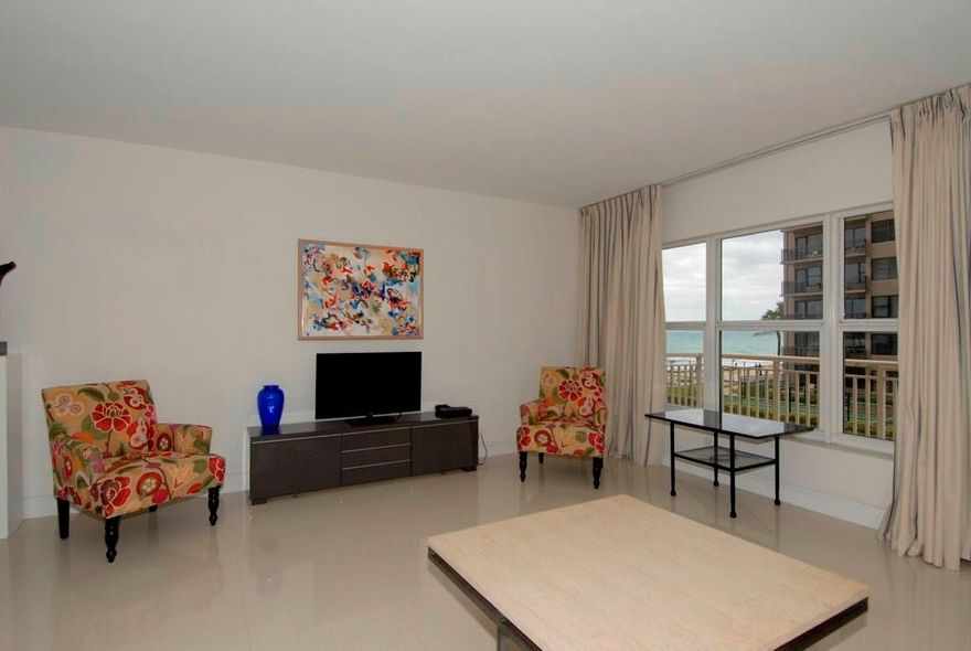 Gaze at the ocean while sitting in your living room, bedroom or on your balcony. Open kitchen & granite counter tops, recessed lisgting & wine cooler are perfect for gamily gatherings or entertaining your friends. Furnshinings give off a cool but comfortable vibe but unit can be rented UNFURNISHED. Building is fully renovated in a clean contemporary fashion and located in the heart of the Galt Ocean Mile. Just steps to the sand and walking distance to dining, shopping and banking.