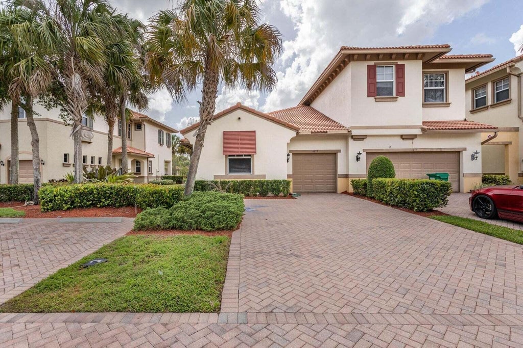 Photo of 6072 NW 116TH Drive, Coral Springs, FL 33076 (MLS # B26081660)
