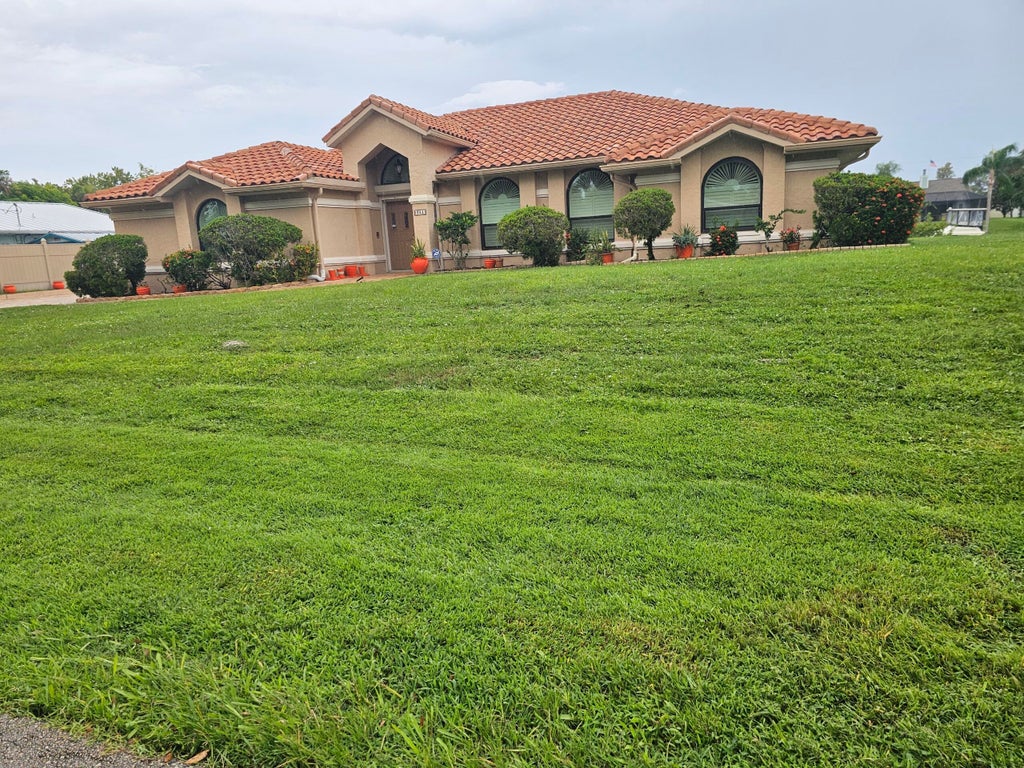 Photo of 382 SE Naranja Avenue, Port Saint Lucie, FL 34983 (MLS # R11125147)
