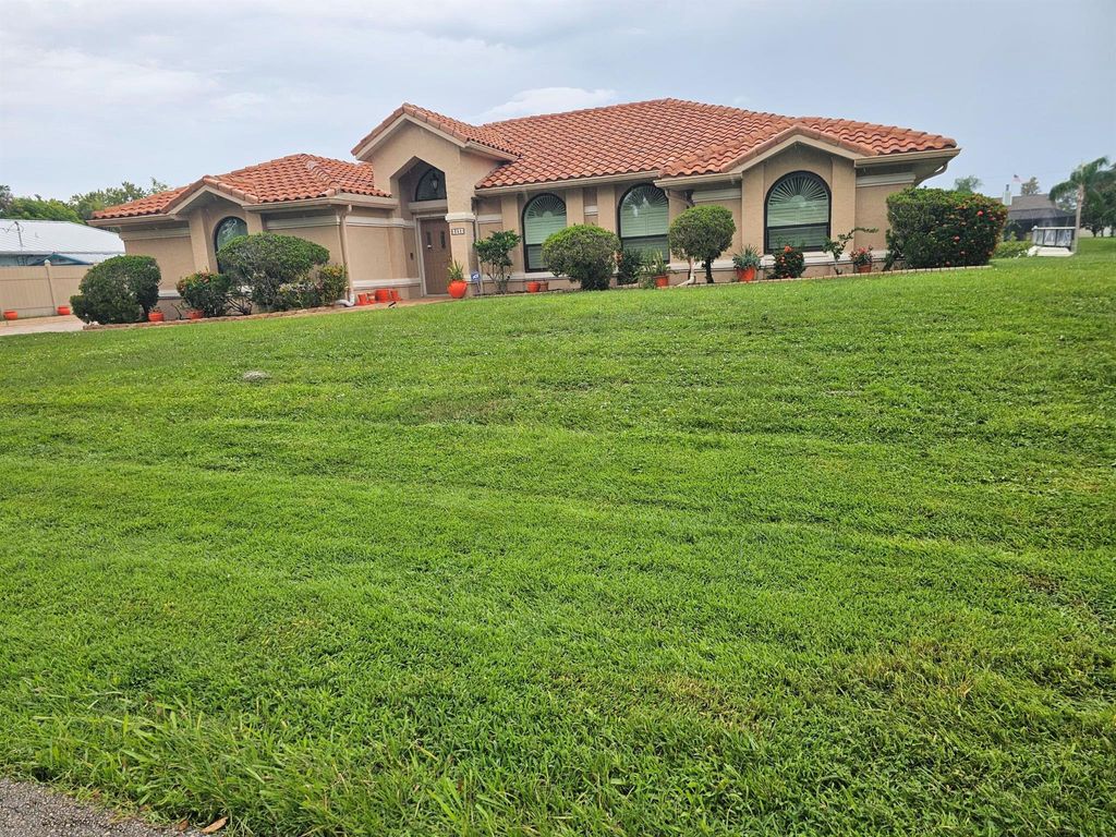 Photo of 382 SE Naranja Avenue, Port Saint Lucie, FL 34983 (MLS # R11125147)