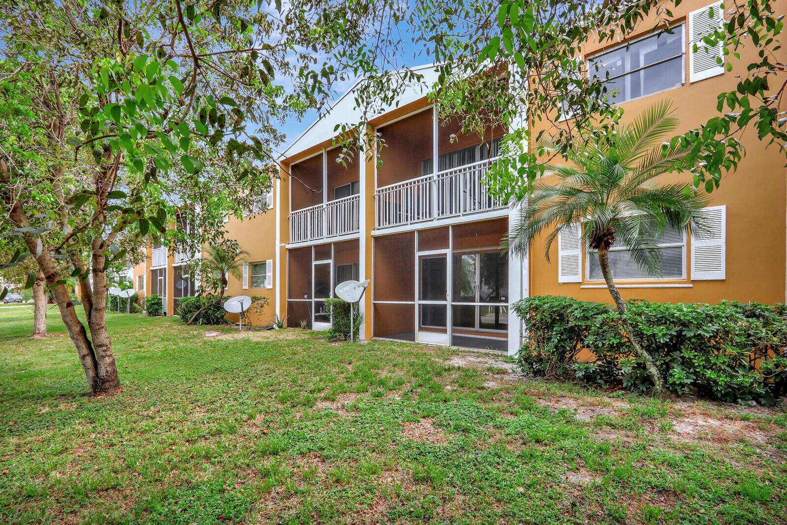 All ages welcome! Updates have JUST BEEN COMPLETED on this ground floor condo with 2 bedrooms & 1.5 baths. NEW interior paint, refrigerator, range, bathroom vanities, toilets, blinds and luxury vinyl flooring throughout, no carpet. New a/c in 2022. Spacious room sizes. Primary bedroom with walk-in closet. Screened, covered patio. Hurricane shutters. 1 assigned parking space, with guest parking available. Laundry room & community pool, just steps from the unit. Close to hundreds of stores & restaurants, some just a short walk away. Motorcycle and personal standard sized pick-up truck are ok. The community requires a 600 minimum credit score. Tenant pays all utilities. No smoking inside unit.