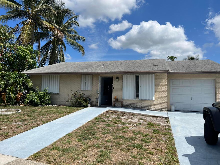 Corner lot home.

2 Full bathrooms, 
3rd bedroom is an office / den, garage is set up as storage and a separate laundry room. Spacious outdoor patio, room for a garden, beautiful mango tree.

Home is complete with accordion shutters, generator, newer roof HVAC system.