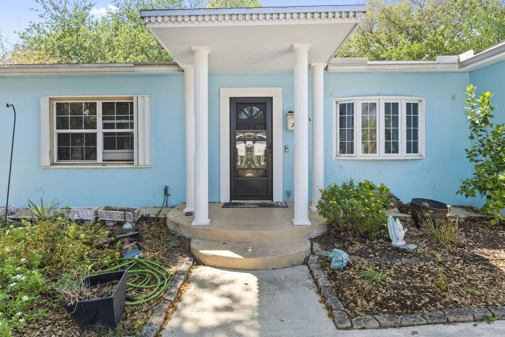 Photo of 3296 SE Monte Vista Street, Port Saint Lucie, FL 34952 (MLS # B26011836)