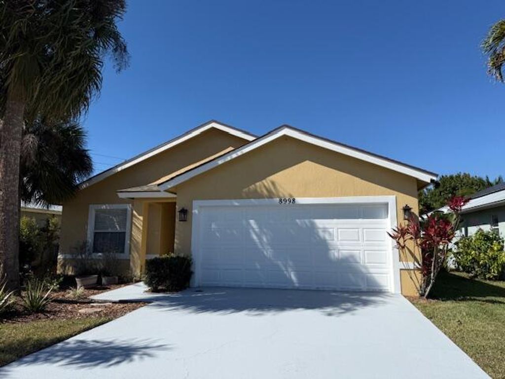 Photo of 8998 SW Bonneville Drive, Stuart, FL 34997 (MLS # R11159750)