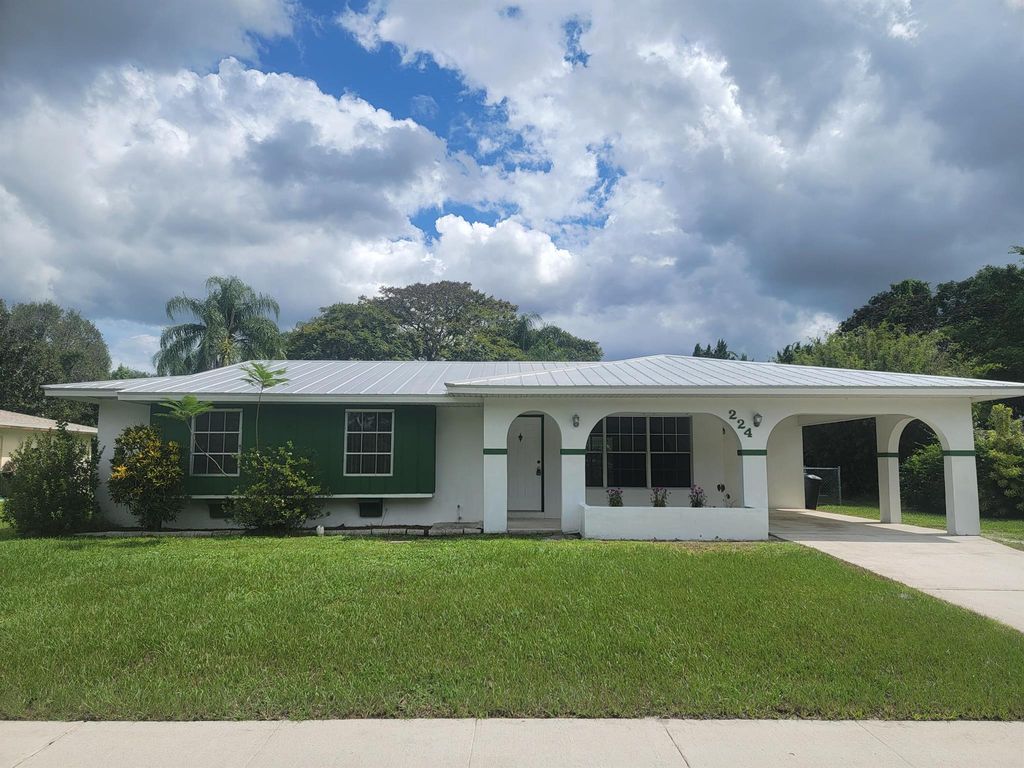 Photo of 224 NE Solida Drive, Port St Lucie, FL 34983 (MLS # R10923552)