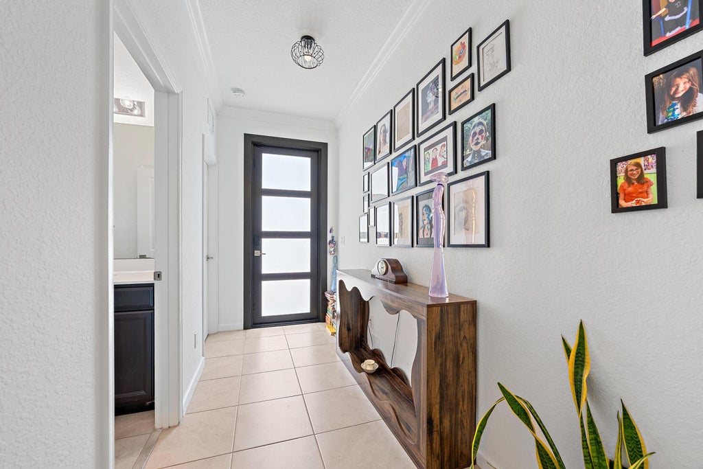 Photo of 4017 Tomoka Drive, Lake Worth, FL 33462 (MLS # B26072494)