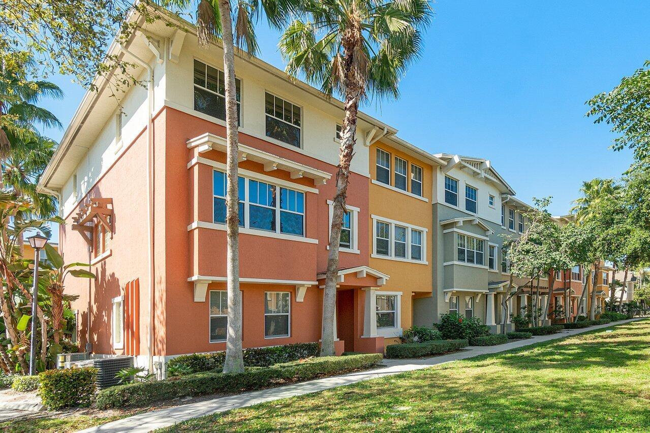 Move in - new tile flooring and paint throughout; 4BR/3.5 Bath, 9 foot ceilings, SS appliances; NEW TILE FLOORS 2-Car Garage, 2,784 total sf. on 3 story townhouse. $350 mth savings with rent that includes water, trash cable AND High speed internet (800MB up/down DARK FIBRE is included with ability to upgrade to 1GB up/down for small fee) all included with rent! Pets OK with approval. Amenities include lake front swimming-pool, BBQ patio area, 24 hour state of the art gym/fitness center, aerobics/dance room for fitness and yoga and social clubhouse with a full kitchen. Cityside has approximate 1.7 miles of running track, 24-hour man gated security and rover. Located only minutes from I-95, Downtown WPB, across street from the new Palm Beach Outlet Mall,Photos are from similar units