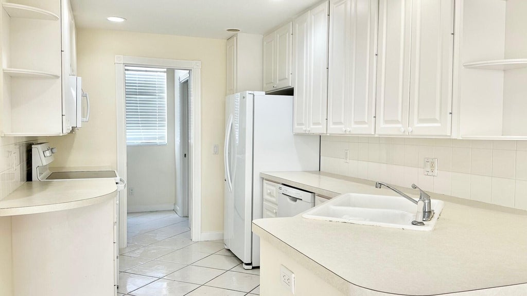 Photo of 2171 Tigris Drive, West Palm Beach, FL 33411 (MLS # B26074218)
