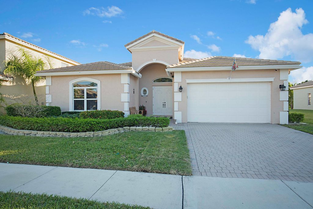 Photo of 6958 Houlton Circle Cir, Lake Worth Beach, FL 33467 (MLS # R10773580)