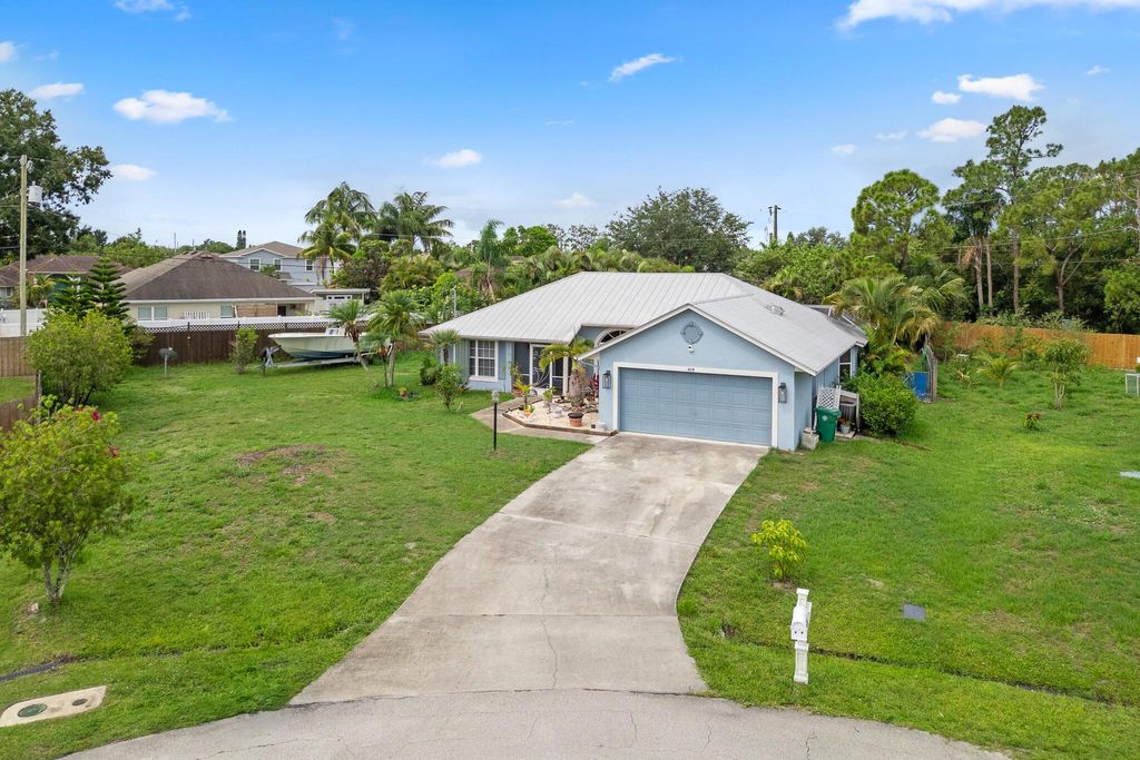 Photo of 504 SW Pea Court, Port Saint Lucie, FL 34953 (MLS # R11097138)