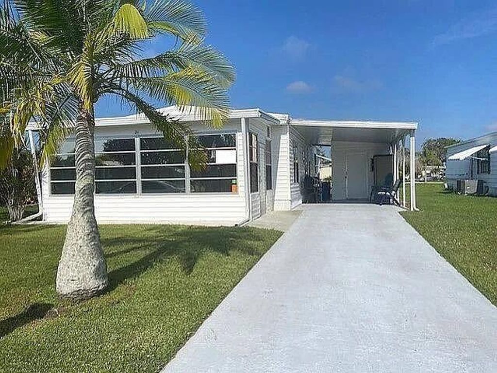 Photo of 21 Flores Way, Port St Lucie, FL 34952 (MLS # R10894618)