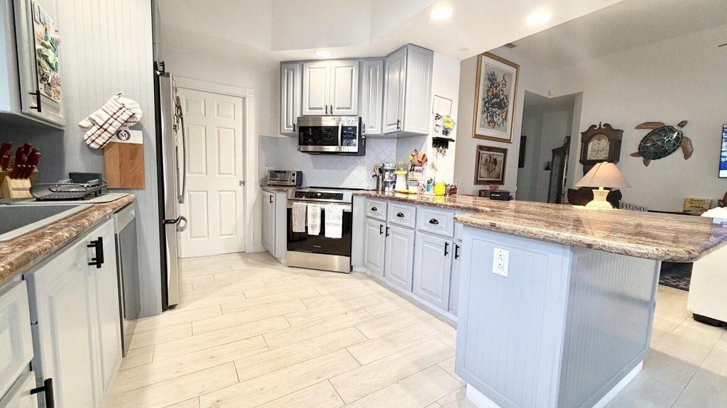 Photo of 2683 Irma Lake Drive, West Palm Beach, FL 33411 (MLS # B26078241)