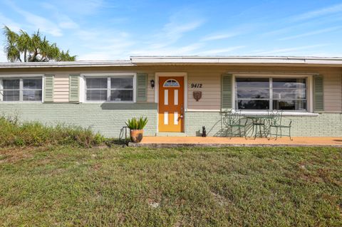 Photo of 9412 Bellewood Street, Palm Beach Gardens, FL 33410 (MLS # B26004909)