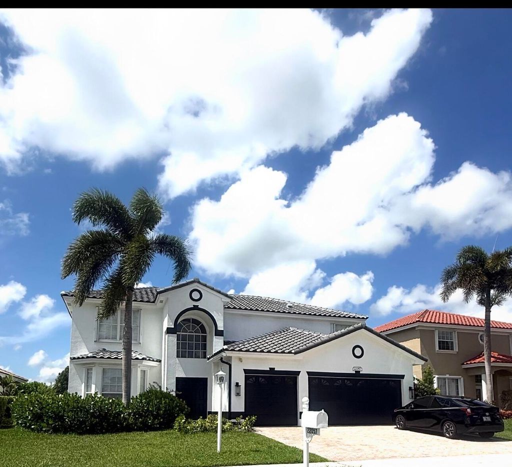 Photo of 22057 Palm Grass Drive, Boca Raton, FL 33428 (MLS # B26031696)