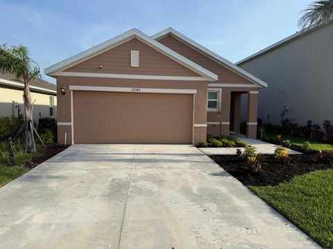 Photo of 12343 Rimini Way, Port Saint Lucie, FL 34987 (MLS # B26005324)