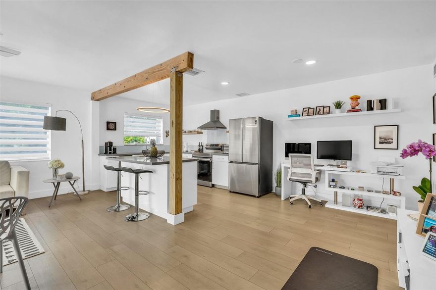 This stunning condo is full of natural light and an open floor plan with endless golf course views.  Nicely updated kitchen with center island, quartz countertops, glass tile backsplash, and high hat lighting.  The flooring through out are an engineered wood flooring and waterproof.  Large screened in porch for entertaining spanning 14' X 10' with entrance directly to the pool with views of Coral Ridge Golf Course.  Property also has storage on site for extra items.  Only a mile from Lauderdale-By-The-Sea and close proximity to shopping and dining.