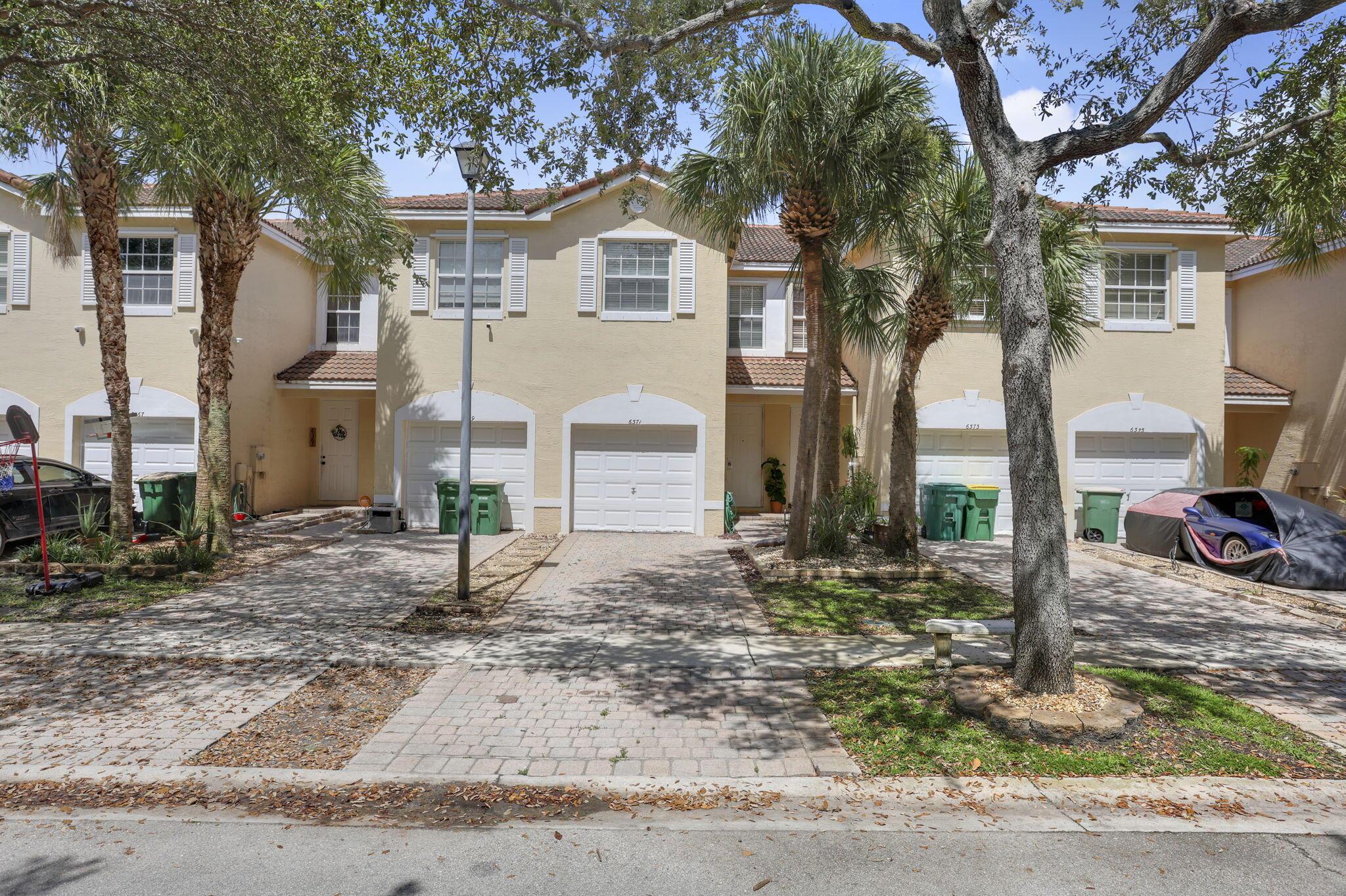 THIS IS THE ONE! The only townhome currently available for purchase in University Landings. This well-maintained home offers 2 bedrooms and 2.5 baths with a sizeable loft to use as an office, den, etc. or convert it to a 3rd bedroom! Brand new refrigerator, range, microwave, vinyl flooring downstairs, new closet doors and freshly painted interior. Ceiling fans in all rooms. Private driveway and one car garage. A/C is 2020. and just serviced. Complete hurricane shutters. Steps to the community pool!