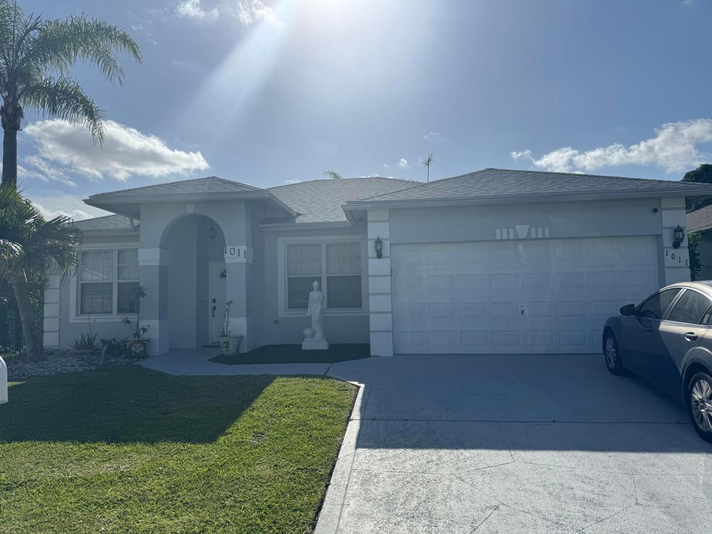 Photo of 1011 Salmon Isle, Greenacres, FL 33413 (MLS # B26015525)