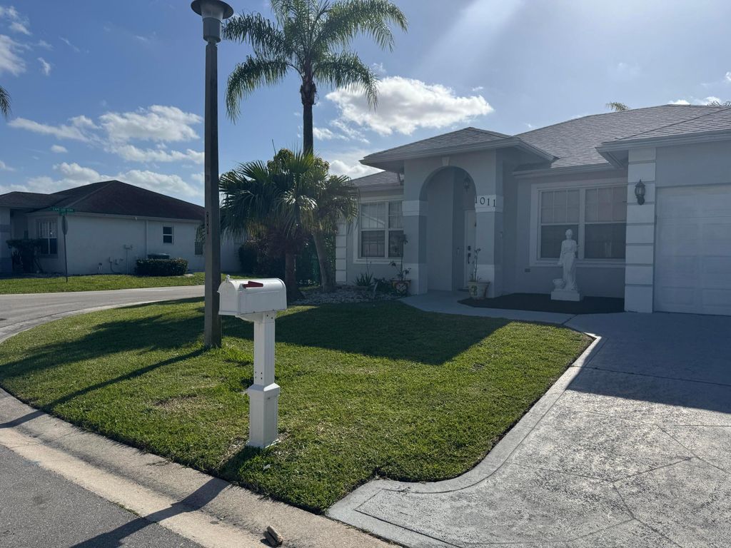 Photo of 1011 Salmon Isle, Greenacres, FL 33413 (MLS # B26015525)