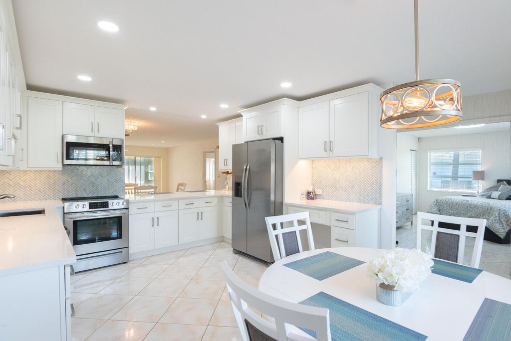 Photo of 5160 Petal Place #D, Delray Beach, FL 33484 (MLS # R11167696)