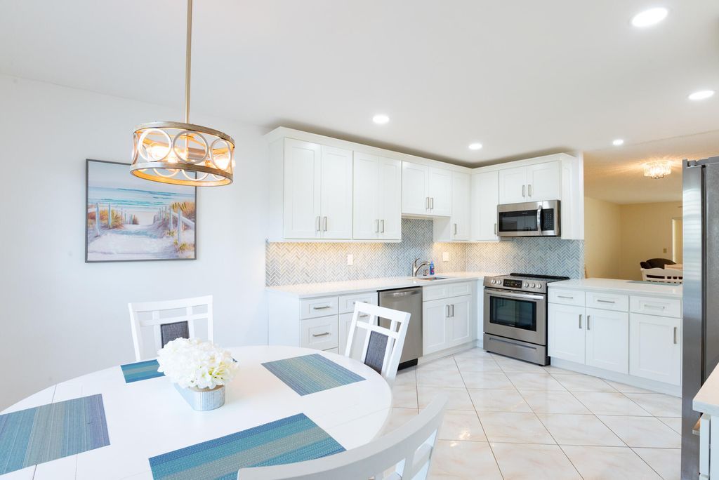 Photo of 5160 Petal Place #D, Delray Beach, FL 33484 (MLS # R11167696)