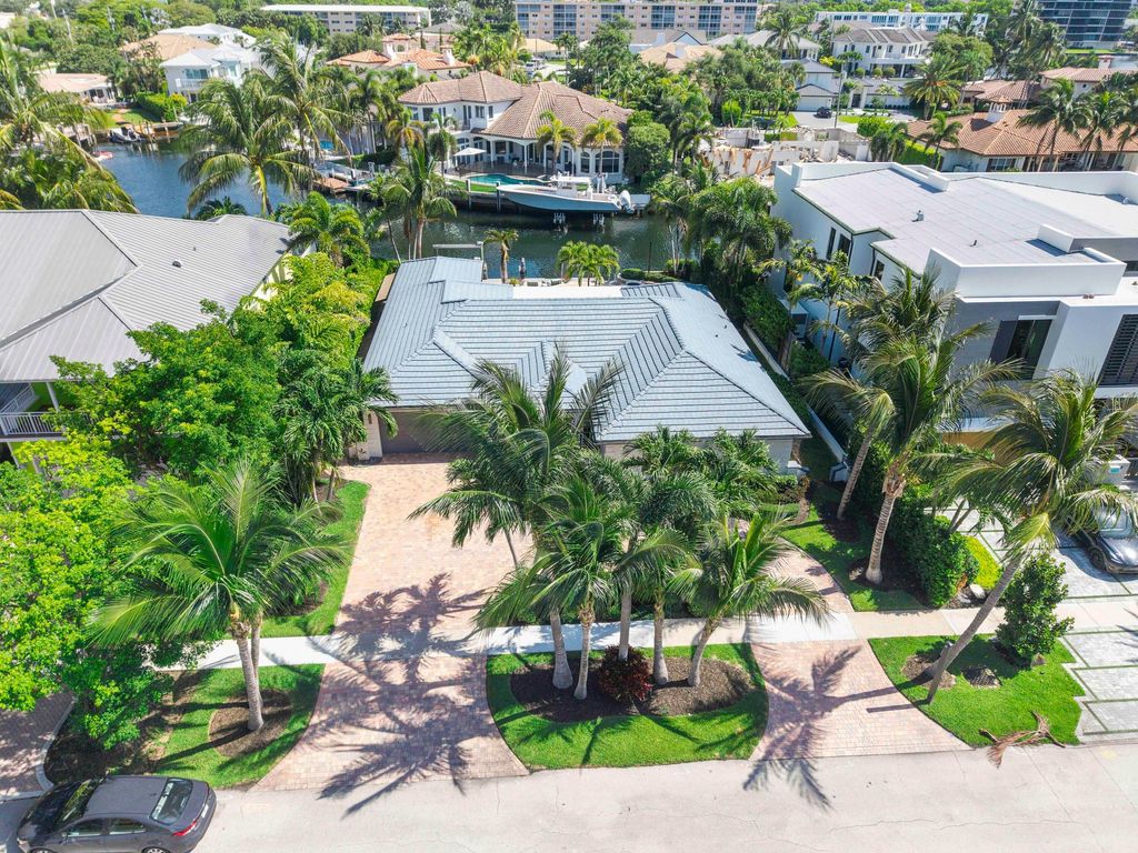 Photo of 725 NE 36th Street, Boca Raton, FL 33431 (MLS # B26046288)