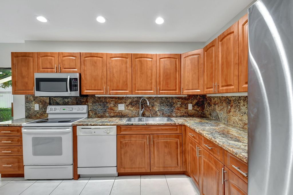 Photo of 70 Cambridge Lane, Boynton Beach, FL 33436 (MLS # R10963929)