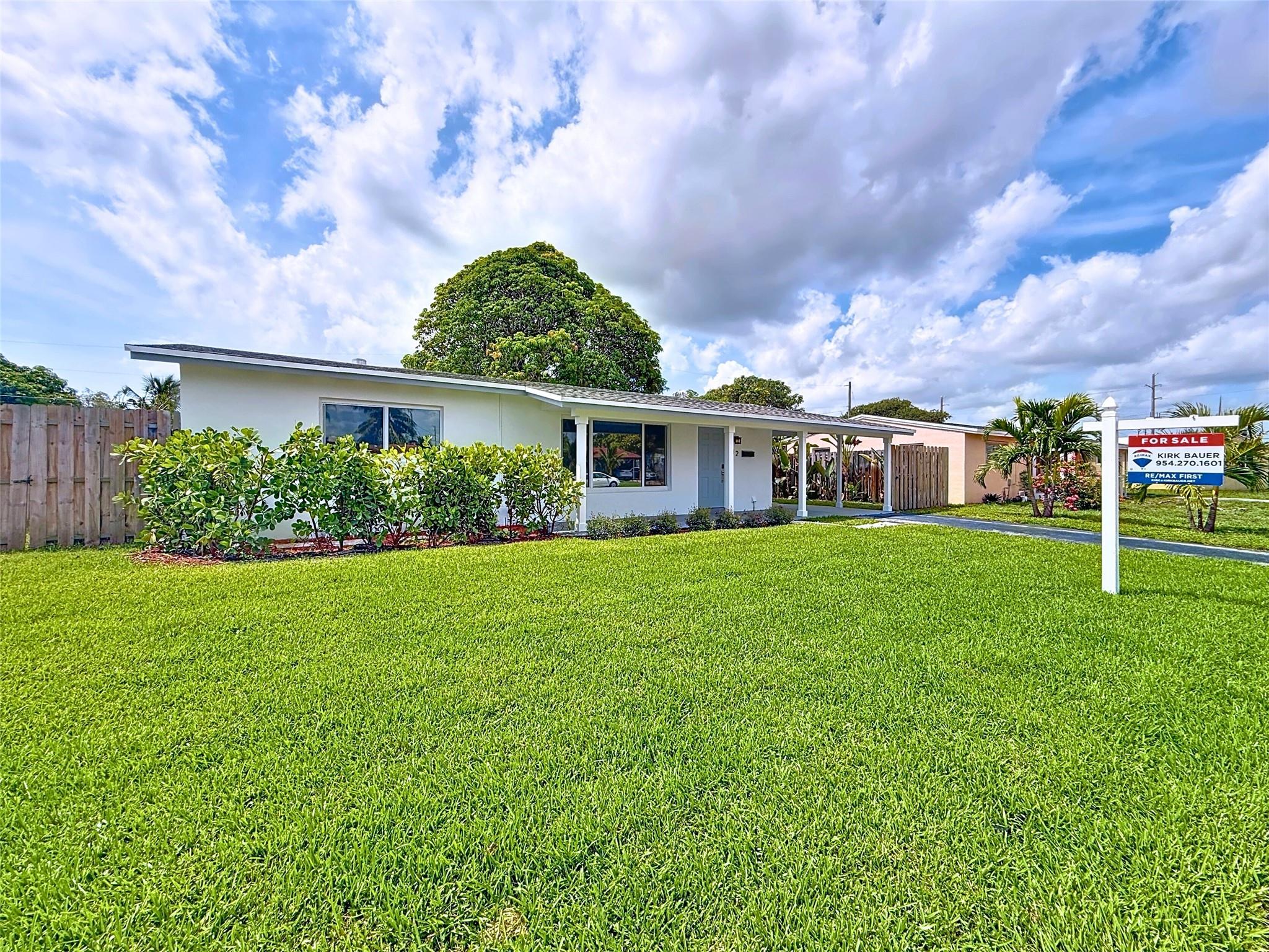 GREAT 3-2 DEERFIELD BEACH HOME - everything Mint - Floor Plan Flows Perfectly - OVERSIZED Lot - Impact Windows - All new flooring - Brand New Master Bathroom - Super Street "SIDEWALKS' - Large Shed Out Back - Turn Key - Tankless Water Heater, and much more - EASY TO SHOW