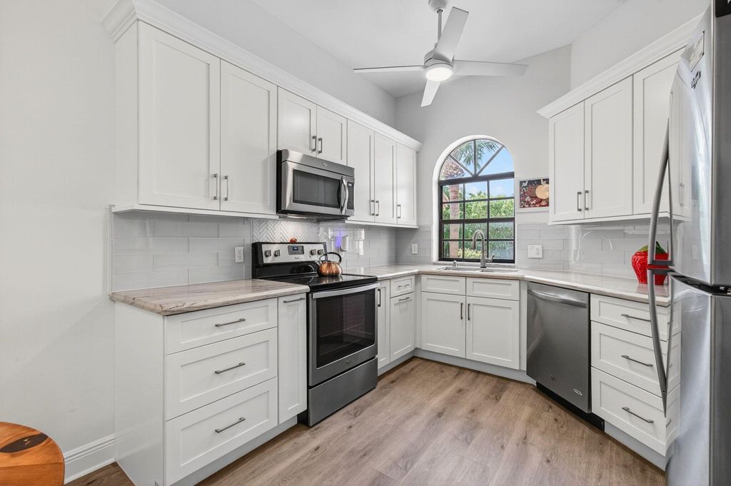 Photo of 5131 Europa Drive #J, Boynton Beach, FL 33437 (MLS # R11107896)