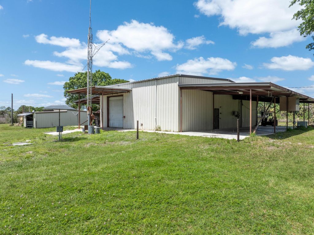 Photo of 21216 Glades Cut Off Road, Port Saint Lucie, FL 34987 (MLS # B26015009)