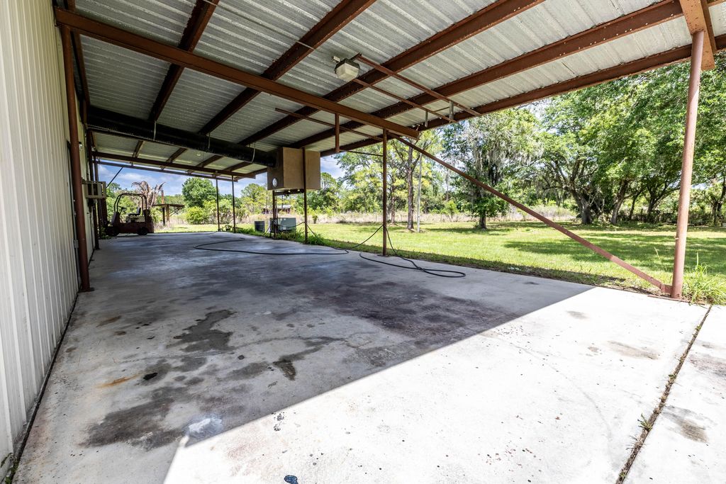 Photo of 21216 Glades Cut Off Road, Port Saint Lucie, FL 34987 (MLS # B26015009)