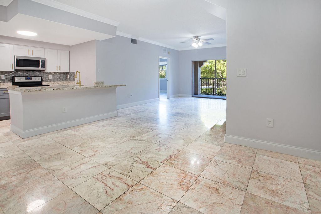 Photo of 5860 W Sample Road #204, Coral Springs, FL 33063 (MLS # B26019381)