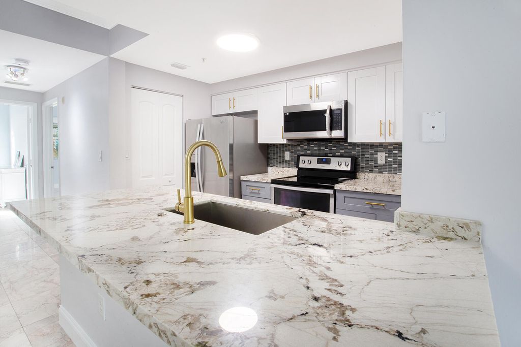 Photo of 5860 W Sample Road #204, Coral Springs, FL 33063 (MLS # B26019381)