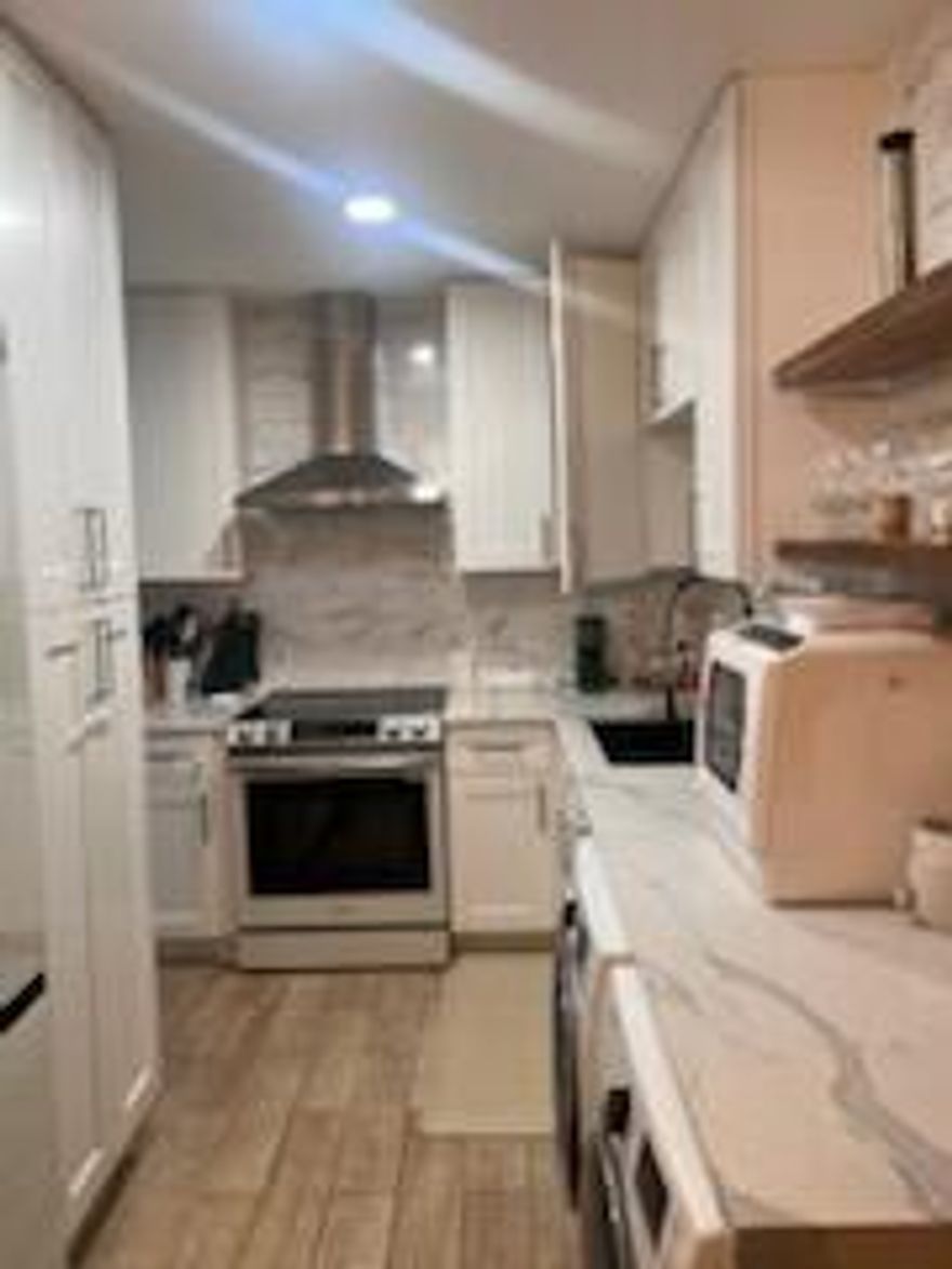 Beautiful spacious 2 bedroom, 2 bath condo. Completely redone in 2022 with high-end finishes. Full-size washer and dryer in the unit. Hurricane windows, tankless water heater. 50-year certification and concrete restoration completed in 2023. Roof replaced in 2017. Located close to the beach, shopping, and restaurants. Basic cable with 2 boxes, internet and water included in maintenance. Minimum credit score of 700. 10% down required. No lease for 2 years. Annual leases only. Resort-style pool, gym, sauna, clubhouse, BBQ areas. 1 parking spot