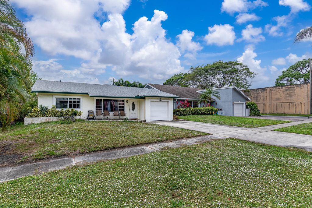 Photo of 564 NW 55th Street, Boca Raton, FL 33487 (MLS # B26012996)