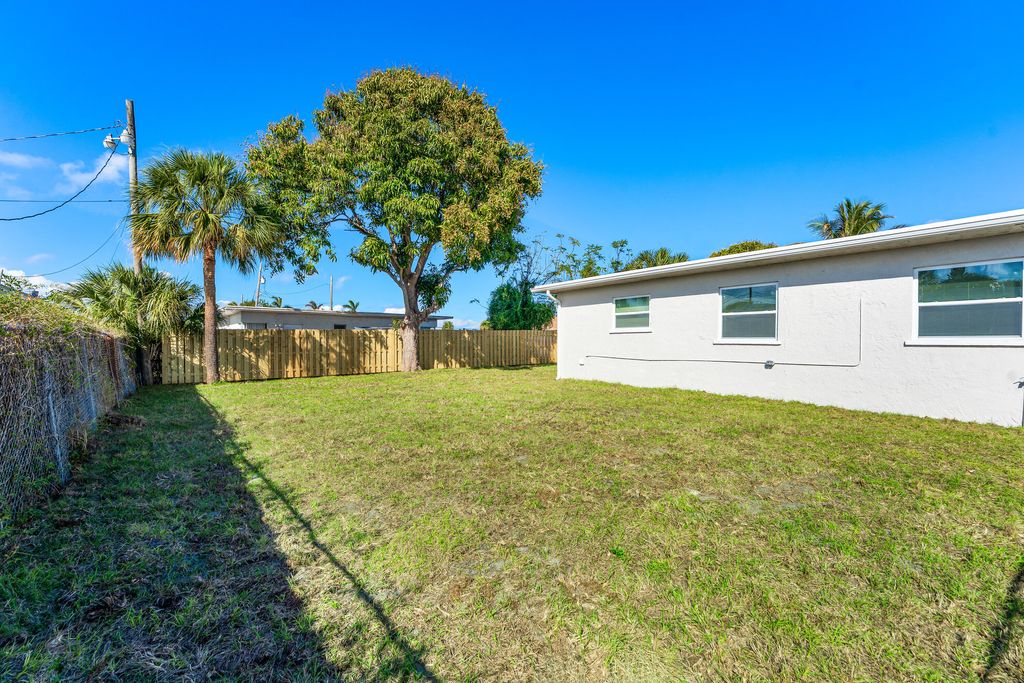 Photo of 656 W 6th Street, Riviera Beach, FL 33404 (MLS # R11169100)