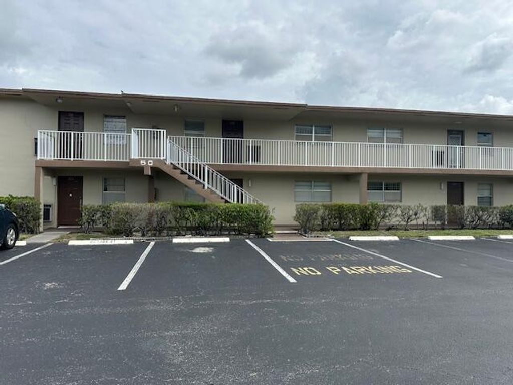 Photo of 7805 W Atlantic Boulevard #202, Margate, FL 33063 (MLS # B26019975)