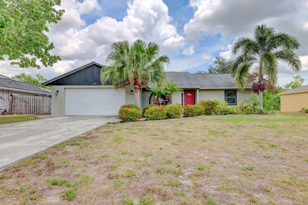 Photo of 2661 SW Monterrey Lane, Port Saint Lucie, FL 34953 (MLS # R10795421)