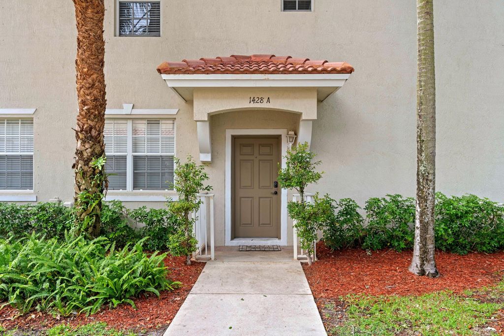 Photo of 1428 W Wickham Circle #A, Delray Beach, FL 33445 (MLS # B26017579)