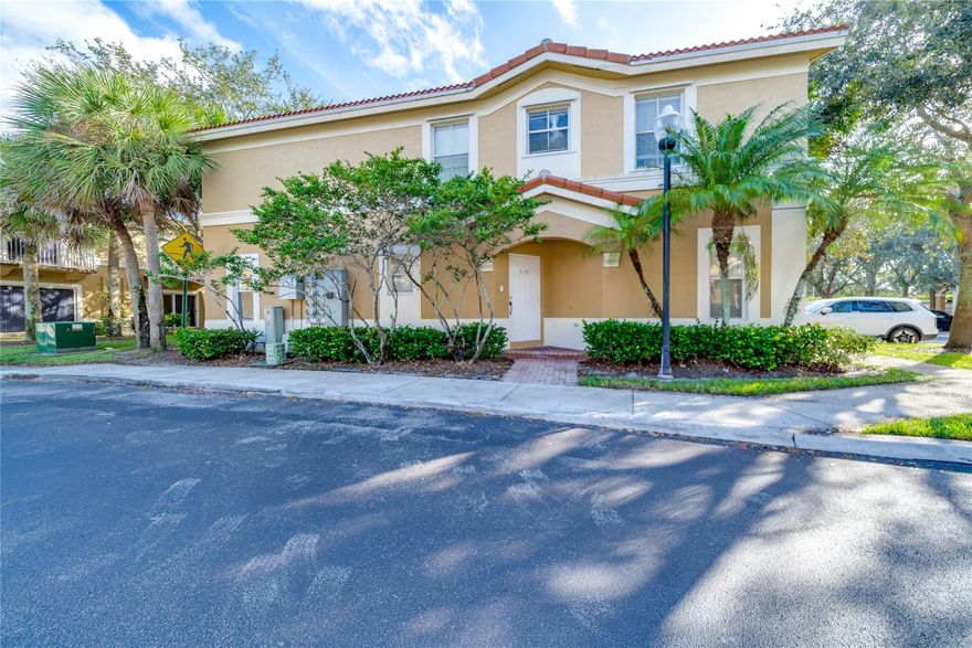Fantastic corner unit townhouse in gated community features kitchen with a breakfast bar that opens to the living room.  New carpet upstairs (July 2023) and tile downstairs. Master bedroom with walk in closet and balcony.  Crown molding throughout.  Freshly painted. Washer and dryer off of the kitchen. 2 pets up to 40 pounds each allowed. Renting allowed. Shows well!  Don't miss it!