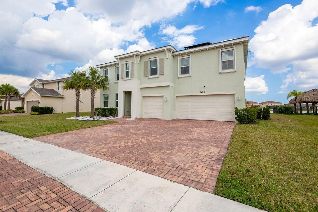 Photo of 7499 NW Deysbrook Lane, Port Saint Lucie, FL 34987 (MLS # R11092983)