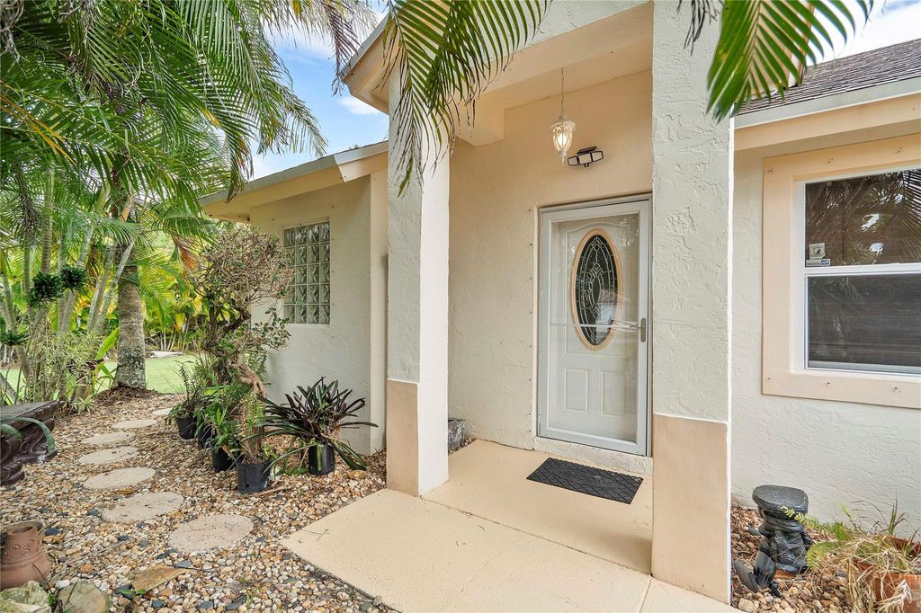 Photo of 12187 E 66th Street, West Palm Beach, FL 33412 (MLS # F10494739)